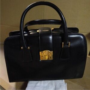 Gucci Black Leather Handbag with Gold Hardware